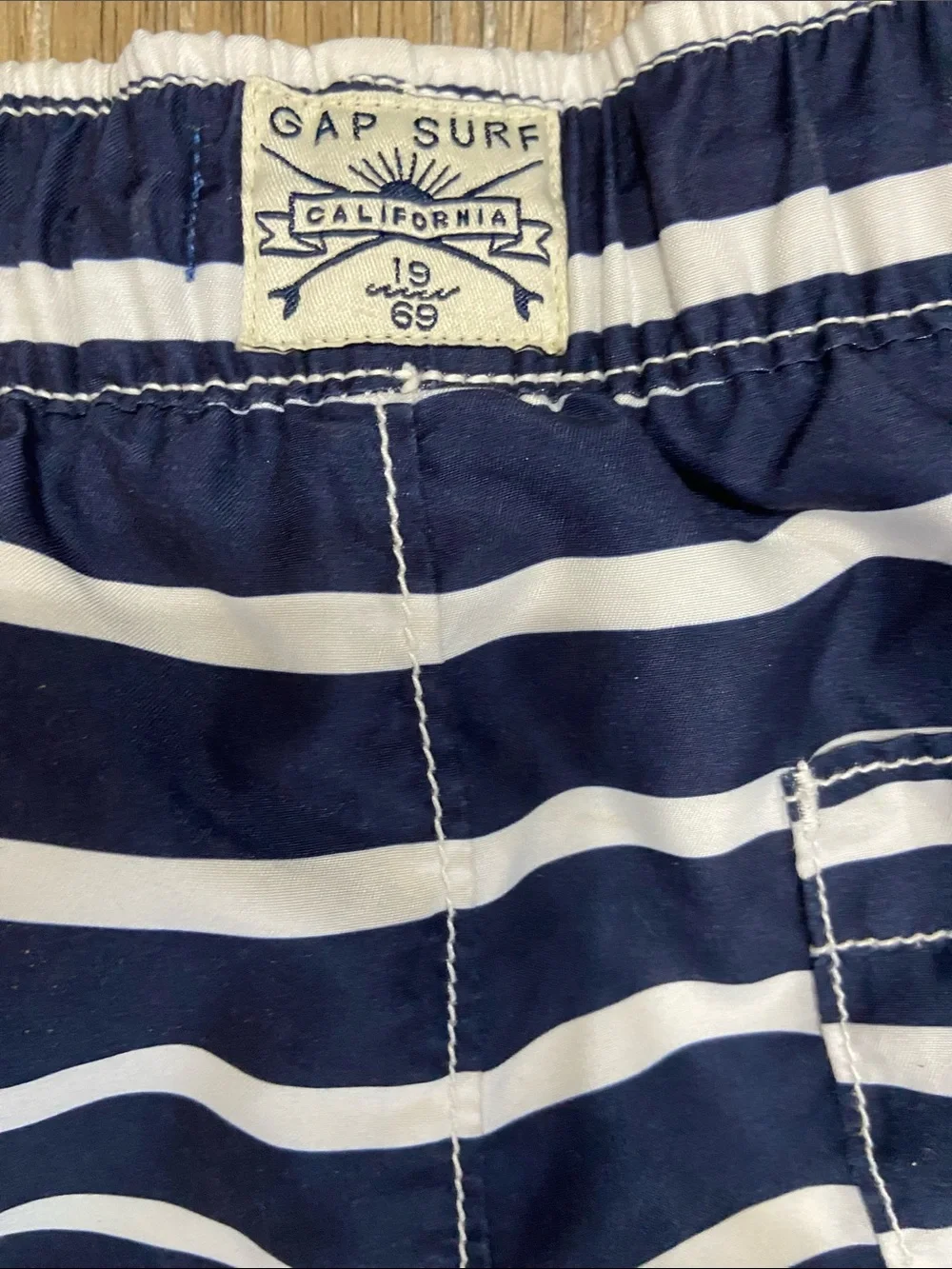 GAP Navy and White Striped Kids Swim Trunks with Orange Drawstring
